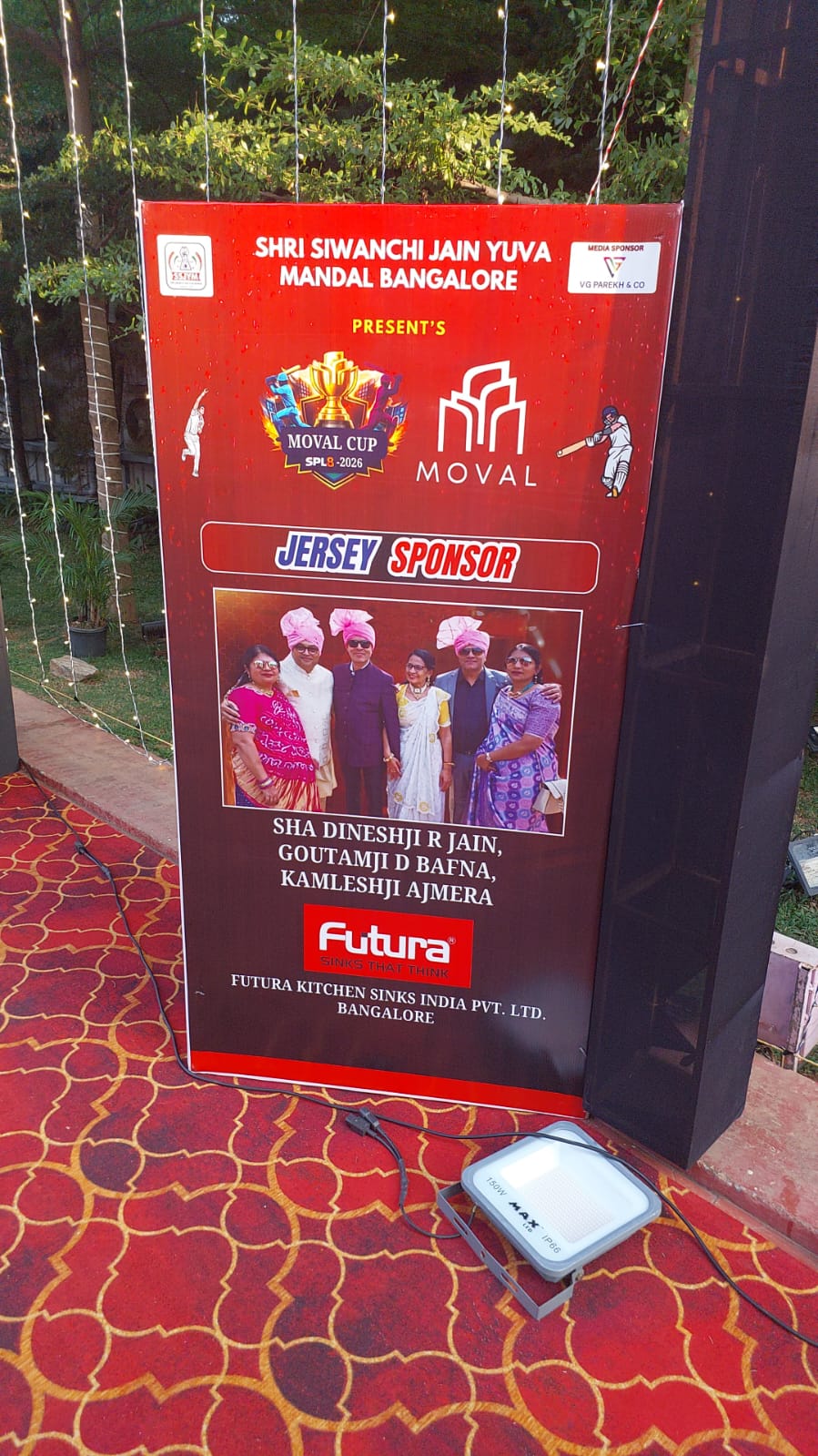 Event sponsor board displaying Futura Kitchen Sinks India Pvt Ltd as jersey sponsor for the Siwanchi Jain Yuva Mandal Moval Cup cricket tournament.